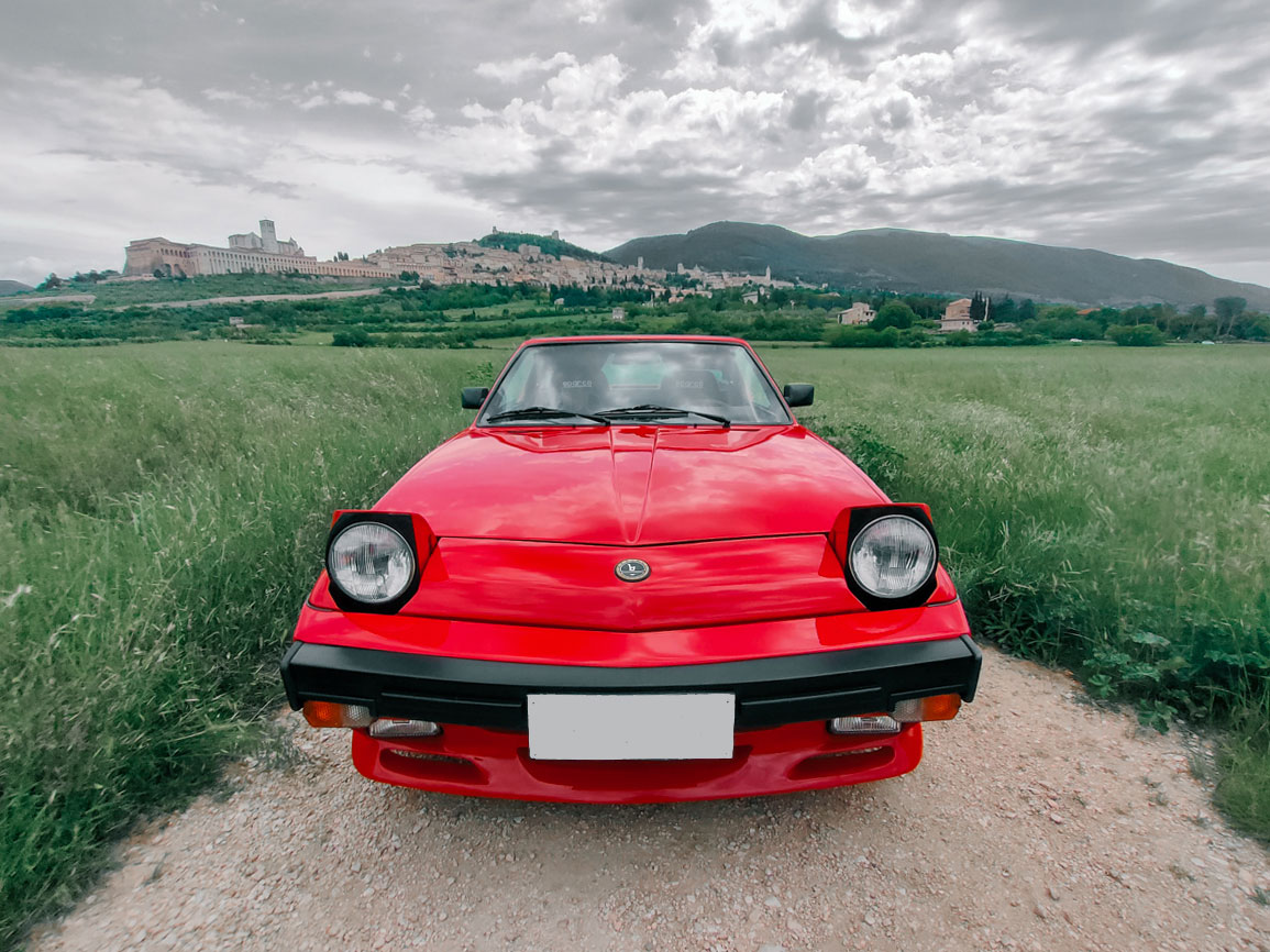 Noleggio Bertone X1/9 icsunonove rossa cabrio per eventi e cerimonie